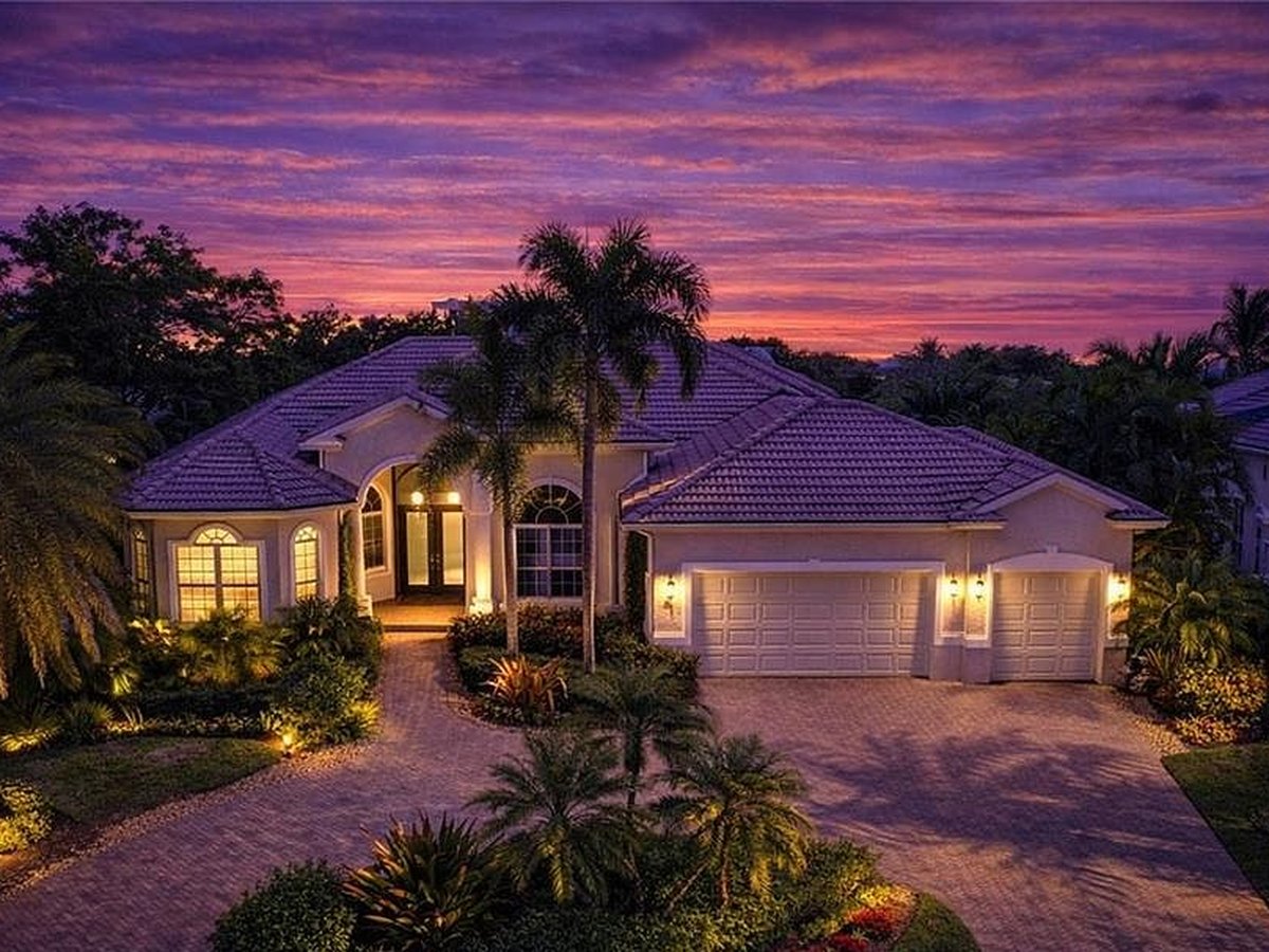3002 Crayton Rd, Naples, at dusk